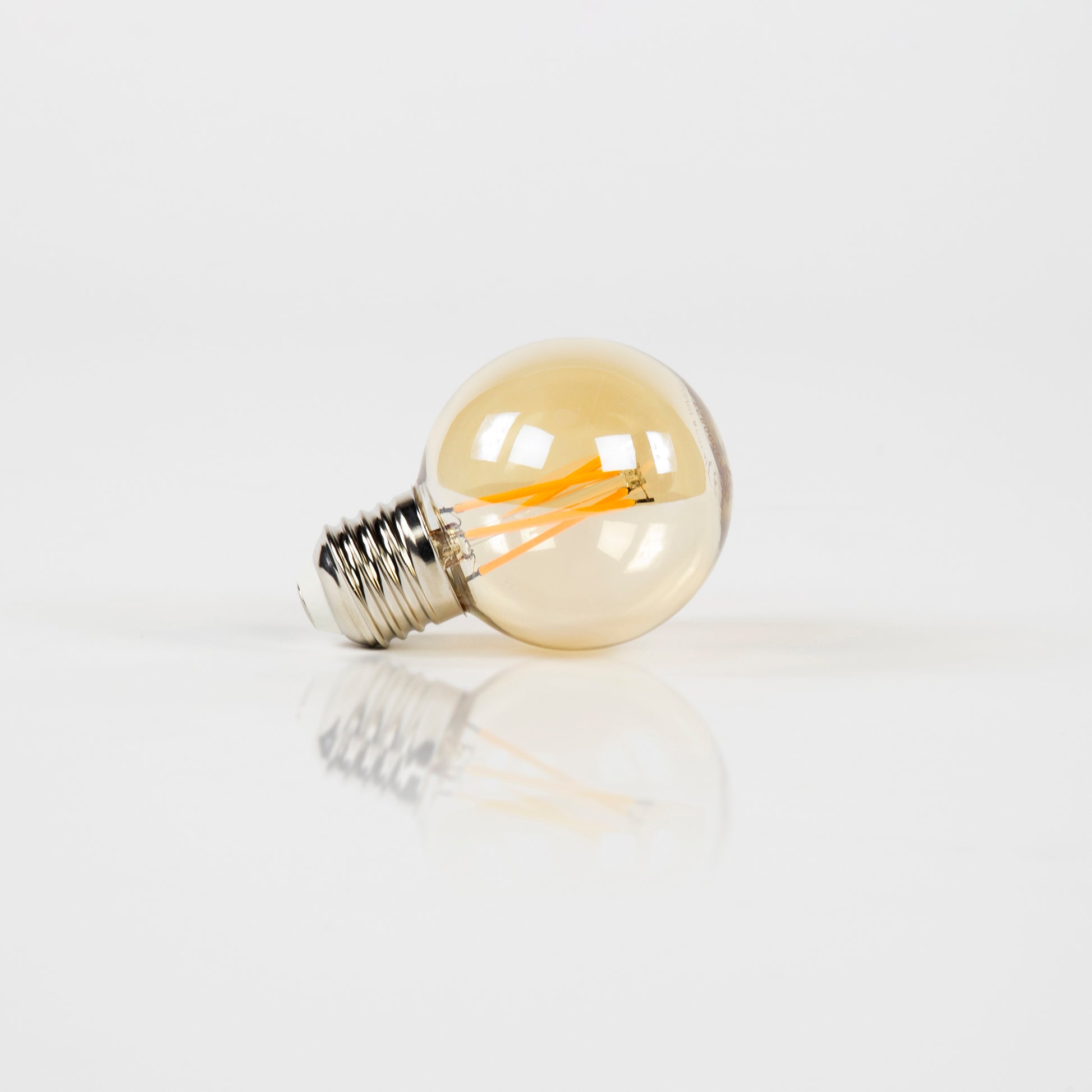 Lichtbron LED [G60] filament bol Ø6cm / Amber glas – afbeelding 1