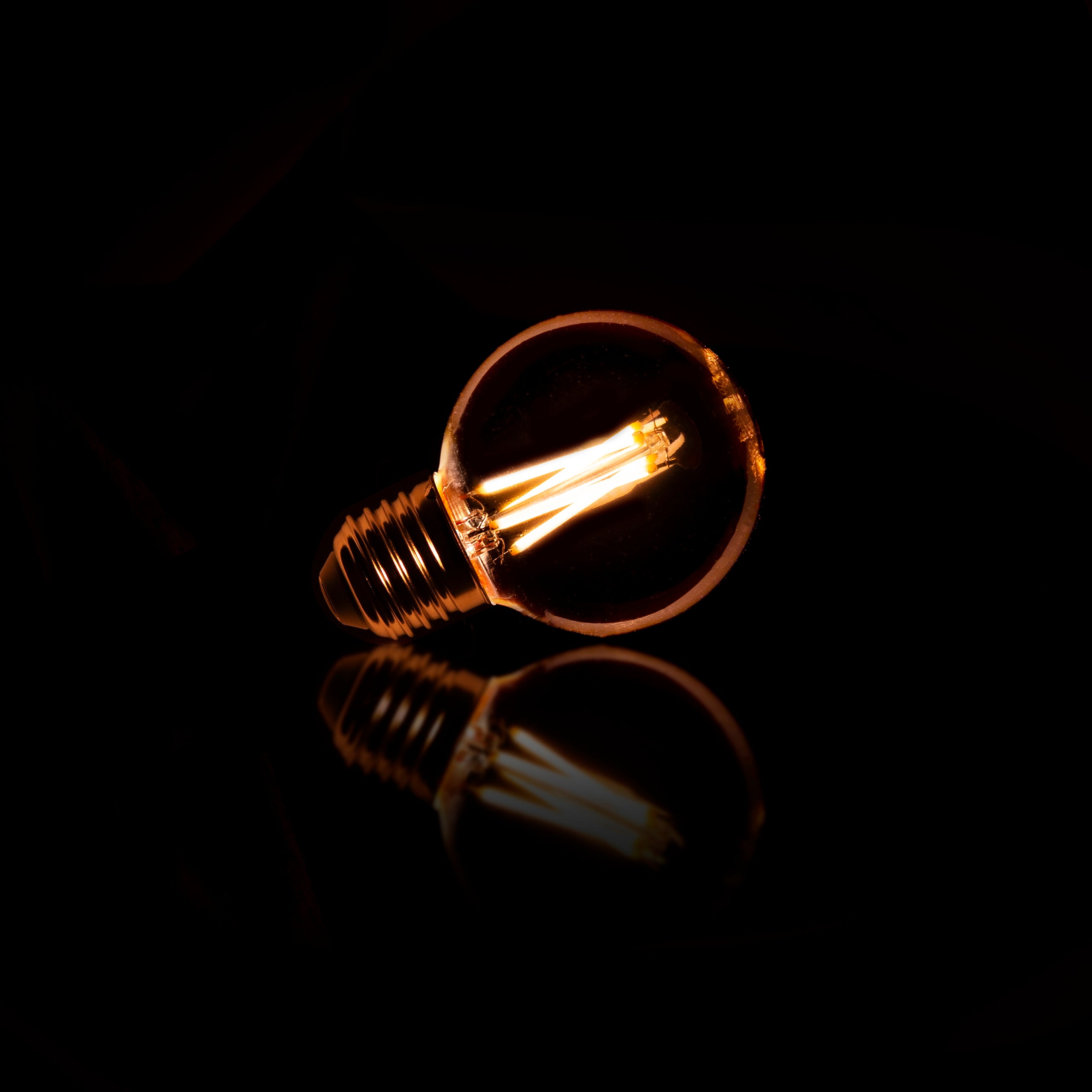 Lichtbron LED [G60] filament bol Ø6cm / Amber glas – afbeelding 2